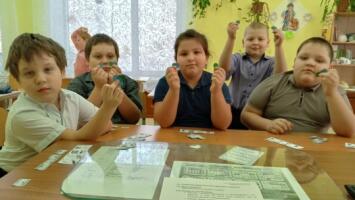 Игры "Покупки Волчонка", "Финансовые ребусы"